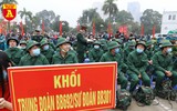 Tân binh đeo khẩu trang, kiểm tra thân nhiệt trong ngày nhập ngũ